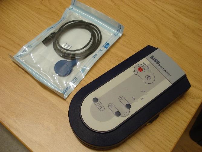 Apnoea alarm with sensor button