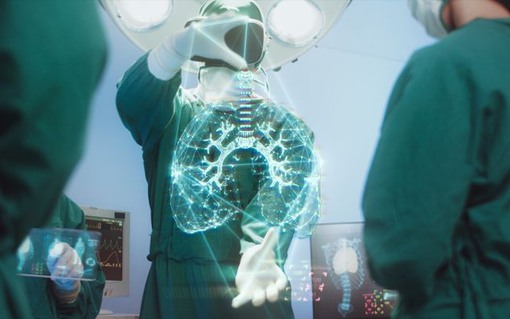 Innovation and Medical technology Concept, Surgeons Team using hi-tech modern virtual reality simulator interface with Hologram diagnose Respiratory System in the operating room